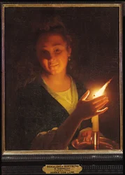 Frau mit einer Kerze